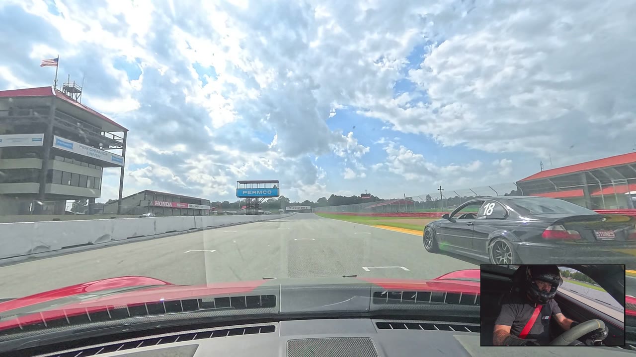 Porsche GT3 RS onboard at Mid-Ohio, passing a BMW on the front straight at start/finish